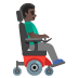 man in motorized wheelchair facing right, dark skin tone